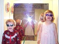 Girls wearing their new sunglasses