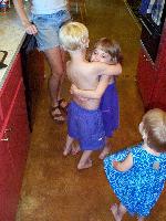 Jordan lifting Mason on the 4th of July