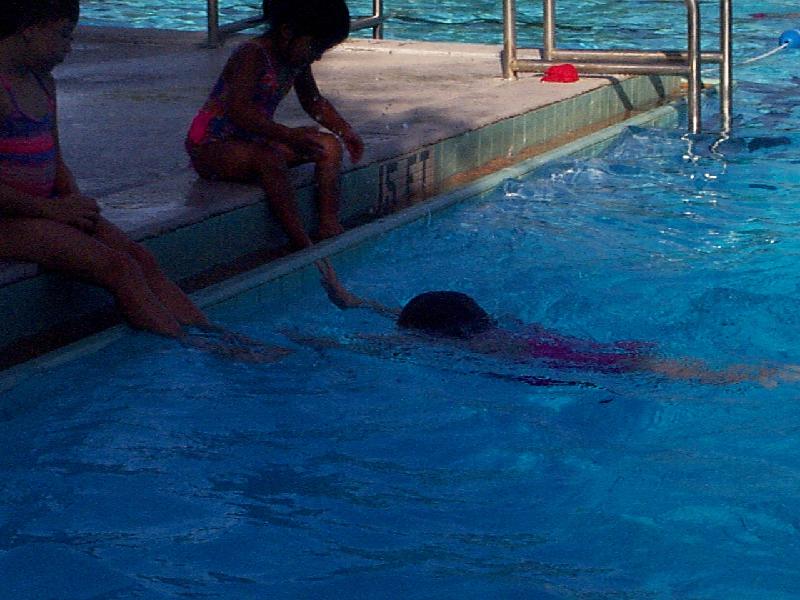 swimming back