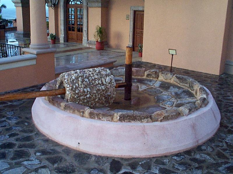 artisan's reproduction of a mill used to make tequila