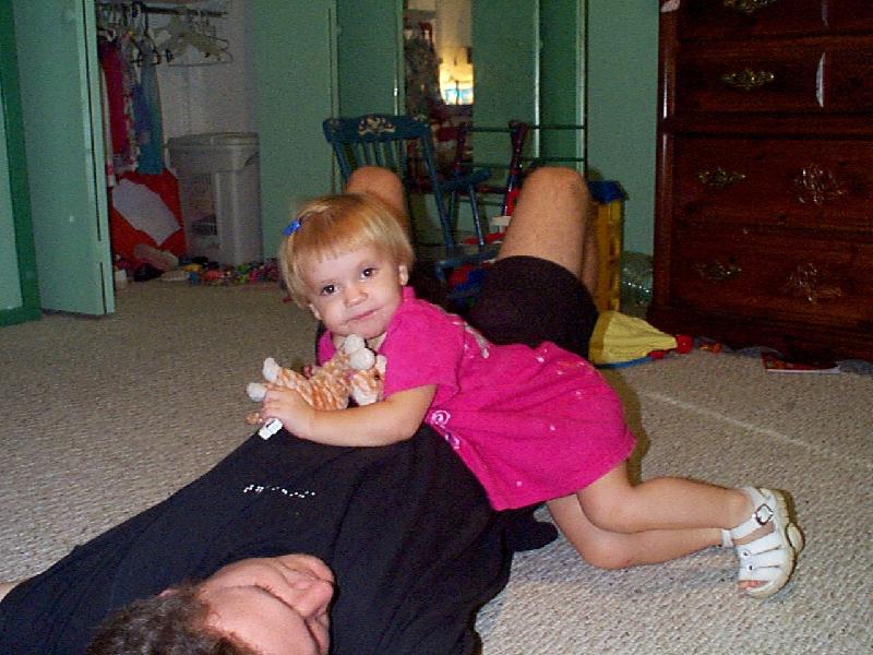Jada climbing on Papa