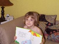 Jordan holding a book