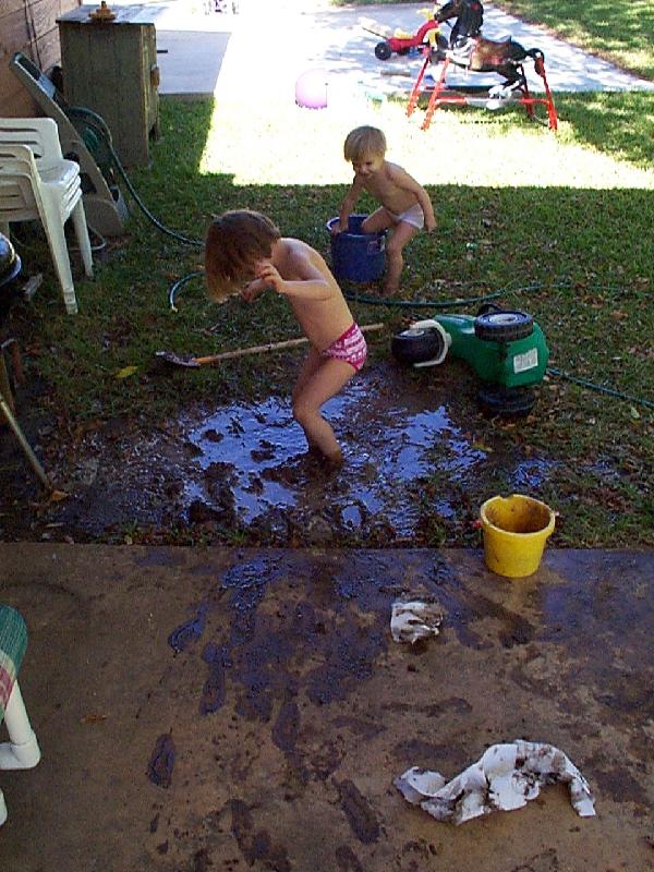 standing in the pit, and rinsing in the bucket