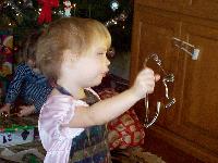 Jada checking out the dinosaur cookie cutters