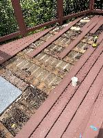 The roof is sloped very slightly for drainage, but the debris has kept that from being very effective. 