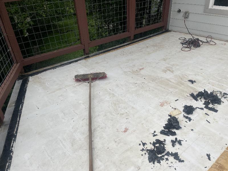Scraping up the window seal that was used around the flashing and under each sleeper. 