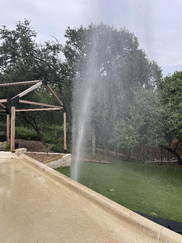 Oopsie! Putting in some conduit to support the fence, hit the irrigation line. 