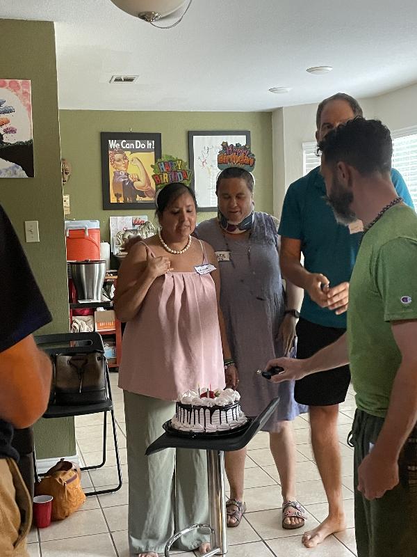 Connection games at David Garrison's. Lalita and Patricia's birthday singing 