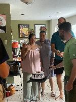 Connection games at David Garrison's. Lalita and Patricia's birthday singing 