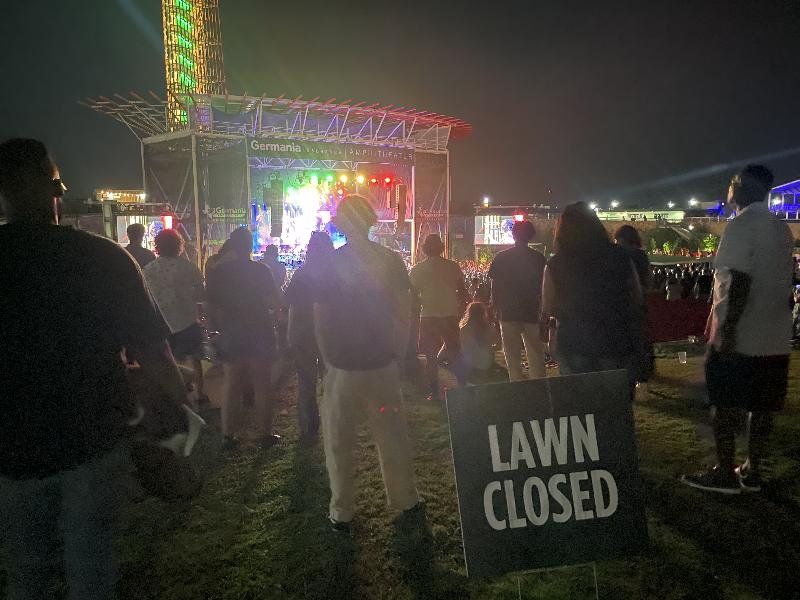 At the Marley Brothers concert at COTA, with a funny sign.