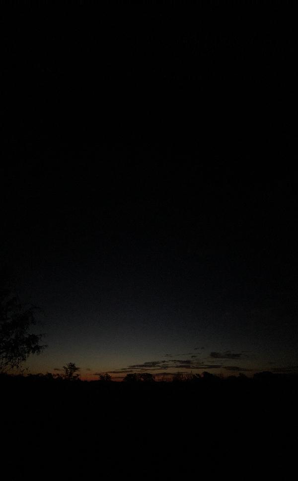 Just before sunrise, vertical panorama with hints of stars. 