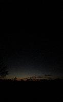 Just before sunrise, vertical panorama with hints of stars. 