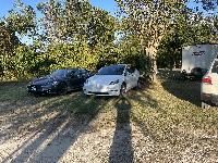 Teslas charging at LOMG 