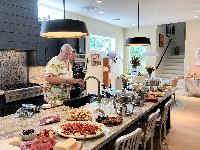 Ric setting out the food 