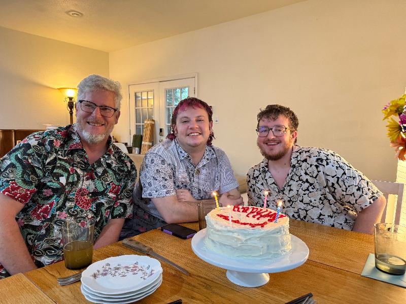 Steve, Lee, and Nico enjoying some cake 