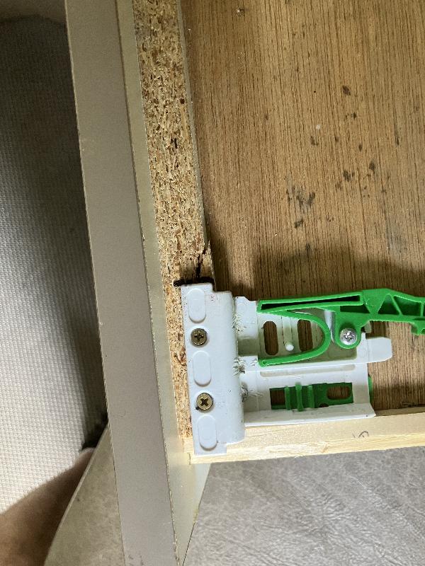 Capturing details of how the drawers attach to the slides 