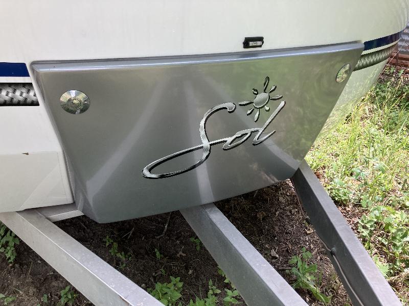 Front propane cover with upgraded pushbutton latches 