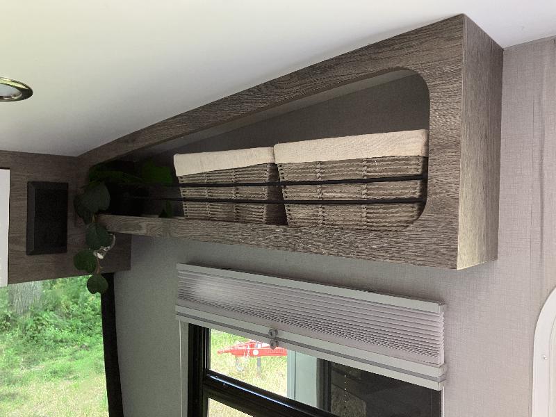 Storage above the passenger side front dinette 