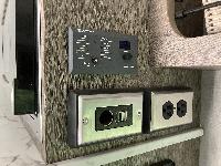 Original DC and AC outlets, plus the new Victron battery and inverter control panel.  (20250513-115939.jpg)