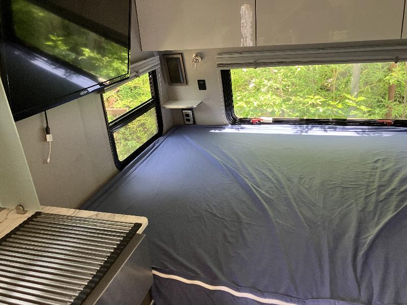 Queen size bed - zip on sheets included 